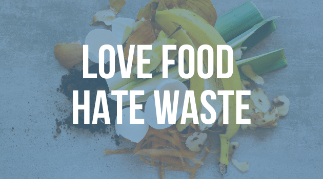 A graphic with text "Love food hate waste", the picture in the background is of food scraps.