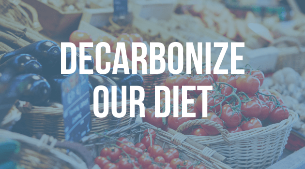 A graphic with text, the image is of fresh produce, and the text reads "Decarbonize our diet"